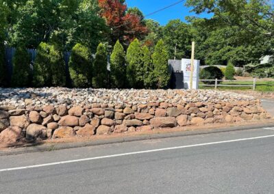 Boulder Wall Build and Repair Project in West Hartford, CT by Coastal Creations, LLC.